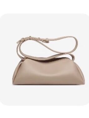 Cream faux leather cross body bag with gold western belt detail